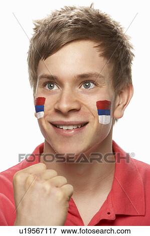 Young Male Sports Fan With Serbian Flag Painted On Face View Large Photo Image Stock Photo - Young Male Sports Fan With Serbian Flag Painted On Face. Fotosearch