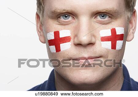 Stock Photo - Young Male Sports Fan With St Georges Flag Painted On Face. Fotosearch