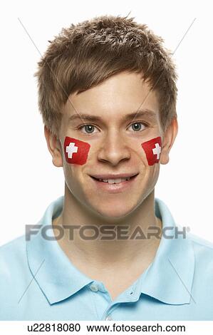 Young Male Sports Fan With Swiss Flag Painted On Face View Large Photo Image Stock Image - Young Male Sports Fan With Swiss Flag Painted On Face. Fotosearch