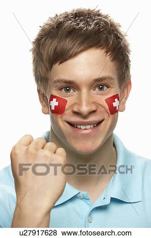 Young Male Sports Fan With Swiss Flag Painted On Face View Large Photo Image Stock Photo - Young Male Sports Fan With Swiss Flag Painted On Face. Fotosearch