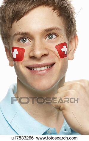 Young Male Sports Fan With Swiss Flag Painted On Face View Large Photo Image Stock Photograph - Young Male Sports Fan With Swiss Flag Painted On Face. Fotosearch