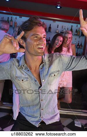Young Man Having Fun In Busy Bar View Large Photo Image Stock Image - Young Man Having Fun In Busy Bar. Fotosearch