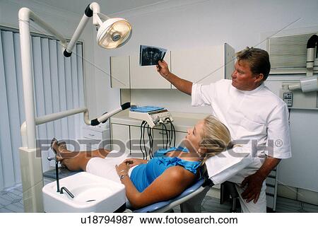 At the dentist View Large Photo Image Stock Photo - At the dentist. Fotosearch
