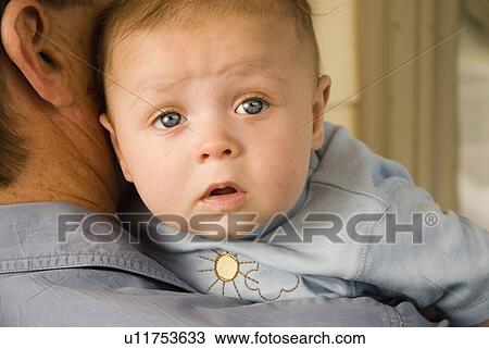 Stock Image - Baby with Dad. Fotosearch