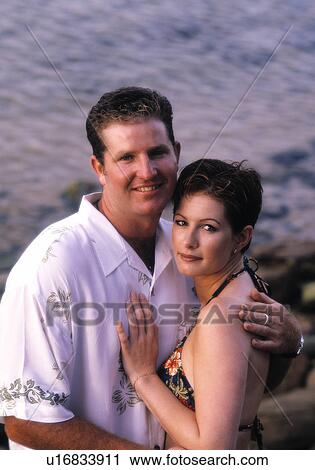 Stock Image - Beach couple. Fotosearch
