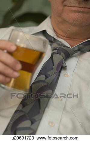 Stock Image - Beer after work. Fotosearch