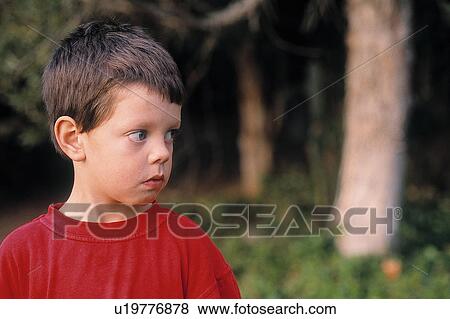 Stock Photo - Boy outside. Fotosearch