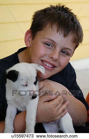 Boy with his dog View Large Photo Image Stock Image - Boy with his dog. Fotosearch