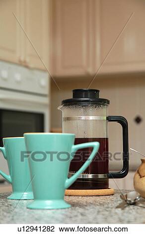 Stock Image - Brewed coffee in the kitchen. Fotosearch