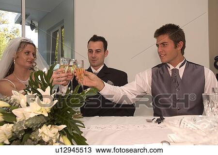 Bridal party toasting View Large Photo Image Stock Image - Bridal party toasting. Fotosearch