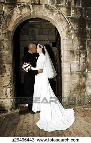 Bride and groom outside church View Large Photo Image Stock Image - Bride and groom outside church. Fotosearch