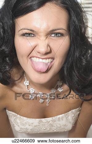 Bride being silly View Large Photo Image Stock Photo - Bride being silly. Fotosearch