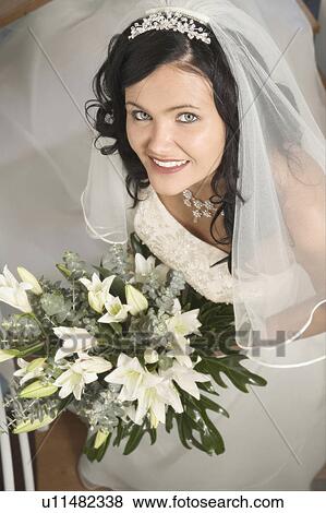 Bride with bouquet View Large Photo Image Stock Photo - Bride with bouquet. Fotosearch