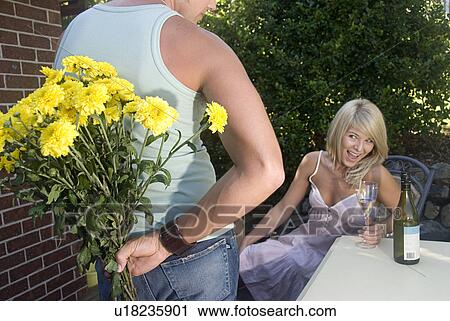 Bringing home flowers View Large Photo Image Stock Image - Bringing home flowers. Fotosearch
