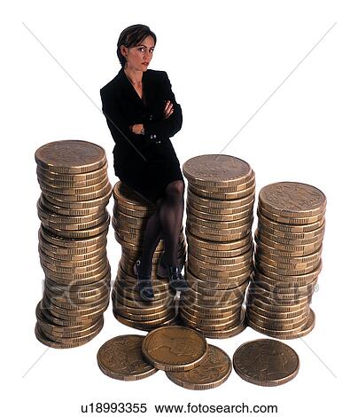 Stock Photography - Business woman sitting on coins. Fotosearch