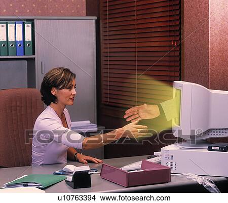 Business woman working at desk View Large Photo Image Picture - Business woman working at desk. Fotosearch