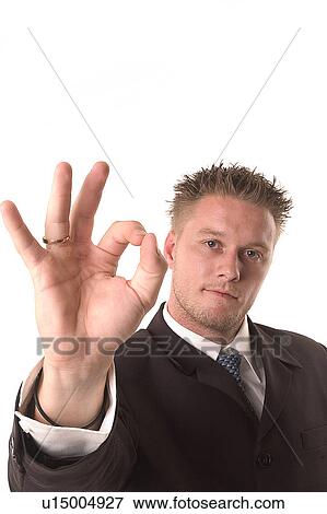 Businessman giving the okay sign View Large Photo Image Stock Photo - Businessman giving the okay sign. Fotosearch