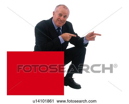 Stock Image - Businessman with a sign. Fotosearch