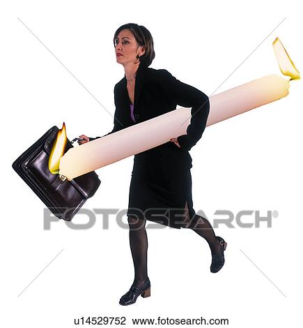 Stock Image - Businesswoman burning the candle at both ends. Fotosearch