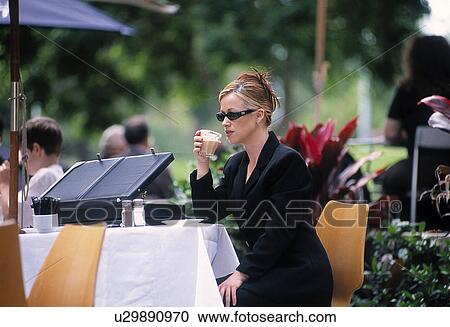 Businesswoman drinking coffee View Large Photo Image Stock Image - Businesswoman drinking coffee. Fotosearch