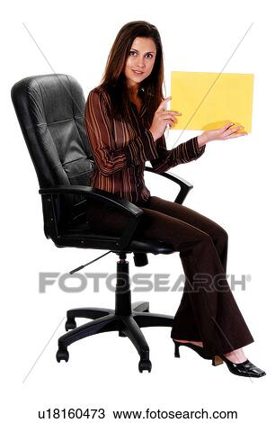 Stock Image - Businesswoman with a sign. Fotosearch