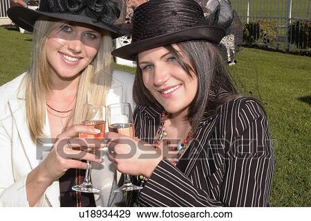 Stock Photo - Celebrating at the Melbourne Cup. Fotosearch