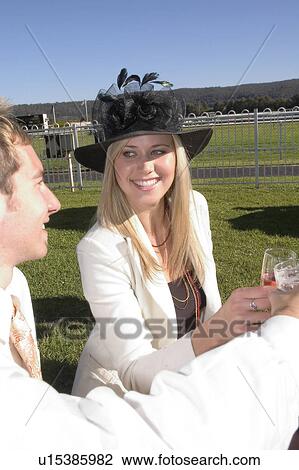 Celebrating at the races View Large Photo Image Stock Image - Celebrating at the races. Fotosearch