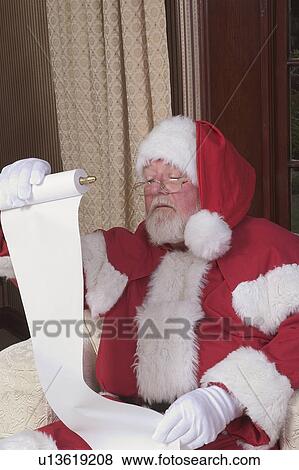 Stock Photo - Checking his list. Fotosearch