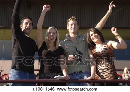 Stock Photograph - Cheering home a winner. Fotosearch