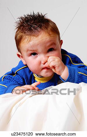 Child picking his nose View Large Photo Image Stock Image - Child picking his nose. Fotosearch