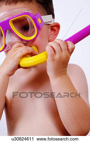Stock Image - Child with snorkel. Fotosearch