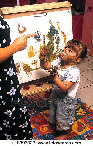 Stock Image - Children painting. Fotosearch
