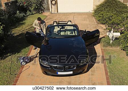 Stock Image - Cleaning the car. Fotosearch