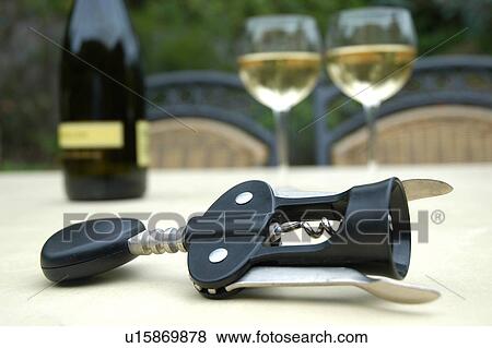Corkscrew and wine View Large Photo Image Stock Photo - Corkscrew and wine. Fotosearch