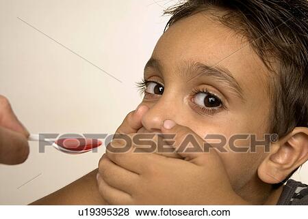 Cough medicine View Large Photo Image Stock Photo - Cough medicine. Fotosearch