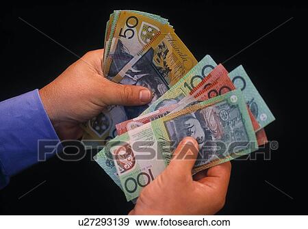 Counting cash View Large Photo Image Stock Photo - Counting cash. Fotosearch