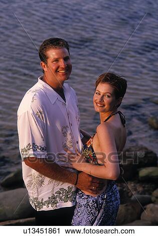 Stock Image - Couple at beach. Fotosearch