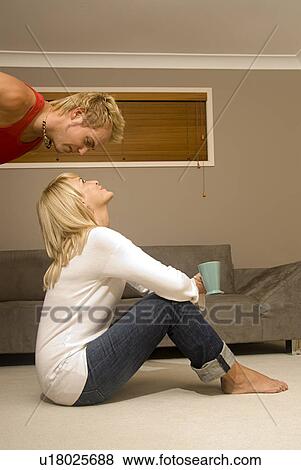 Couple at home View Large Photo Image Stock Photo - Couple at home. Fotosearch