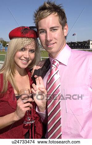 Picture - Couple at the race track. Fotosearch