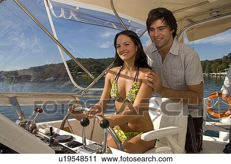 Couple on a boat View Large Photo Image Stock Image - Couple on a boat. Fotosearch