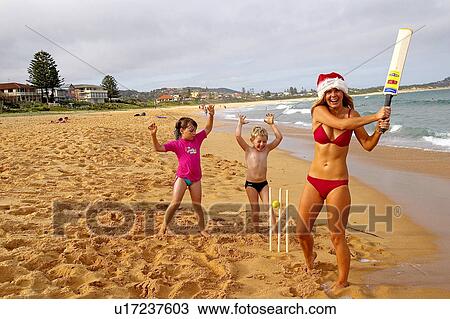 Stock Image - Cricket on the beach. Fotosearch