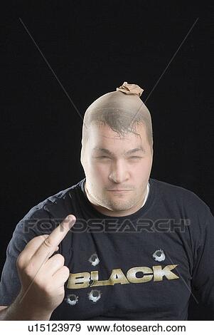 Criminal giving the finger View Large Photo Image Stock Photo - Criminal giving the finger. Fotosearch