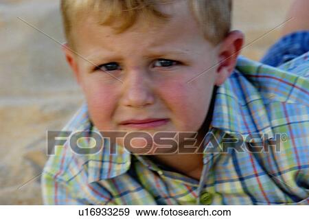 Stock Photo - Crying boy. Fotosearch