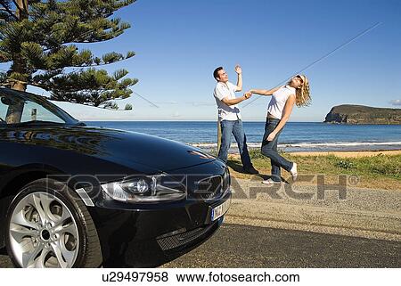 Stock Photo - Dancing couple on the beach. Fotosearch