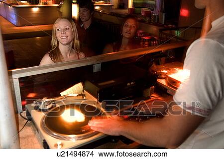 Picture - DJ at nightclub. Fotosearch