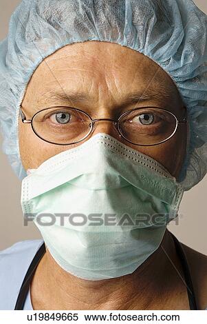 Stock Photography - Doctor with a mask. Fotosearch