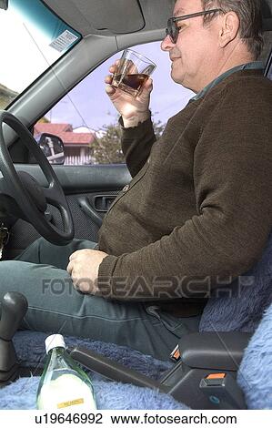 Stock Image - Drinking and driving. Fotosearch
