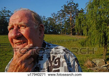 Elderly man on rural property View Large Photo Image Stock Image - Elderly man on rural property. Fotosearch