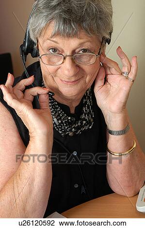 Stock Image - Elderly woman on the telephone. Fotosearch