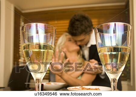 Engaged over dinner View Large Photo Image Stock Photograph - Engaged over dinner. Fotosearch